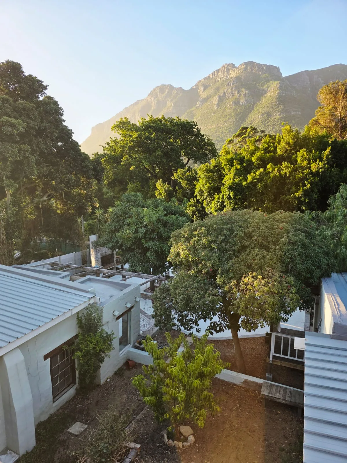 Chestnut Drive — property with mountain backdrop at golden hour