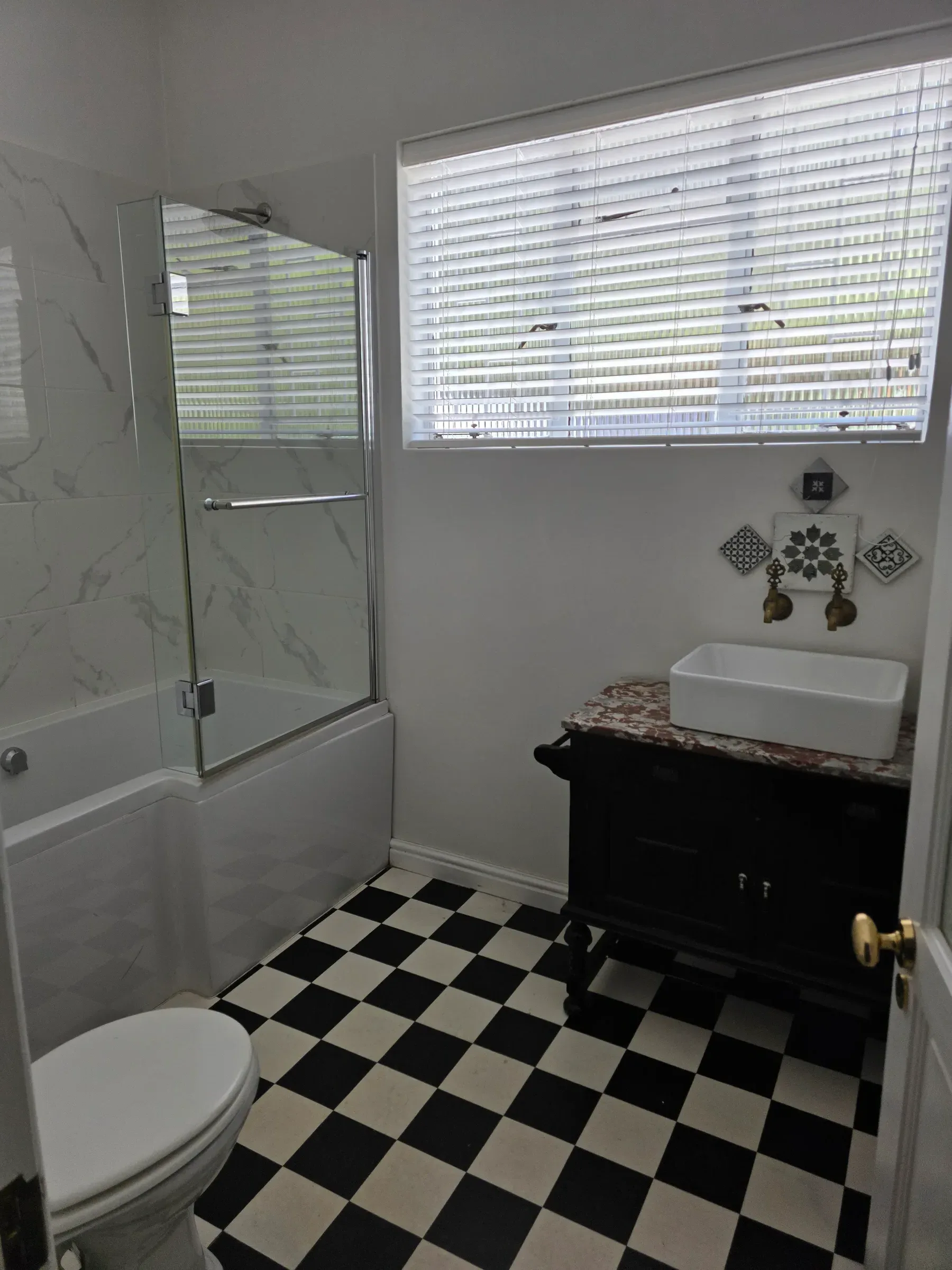 Wolwekloof Estate — black and white checkered bathroom
