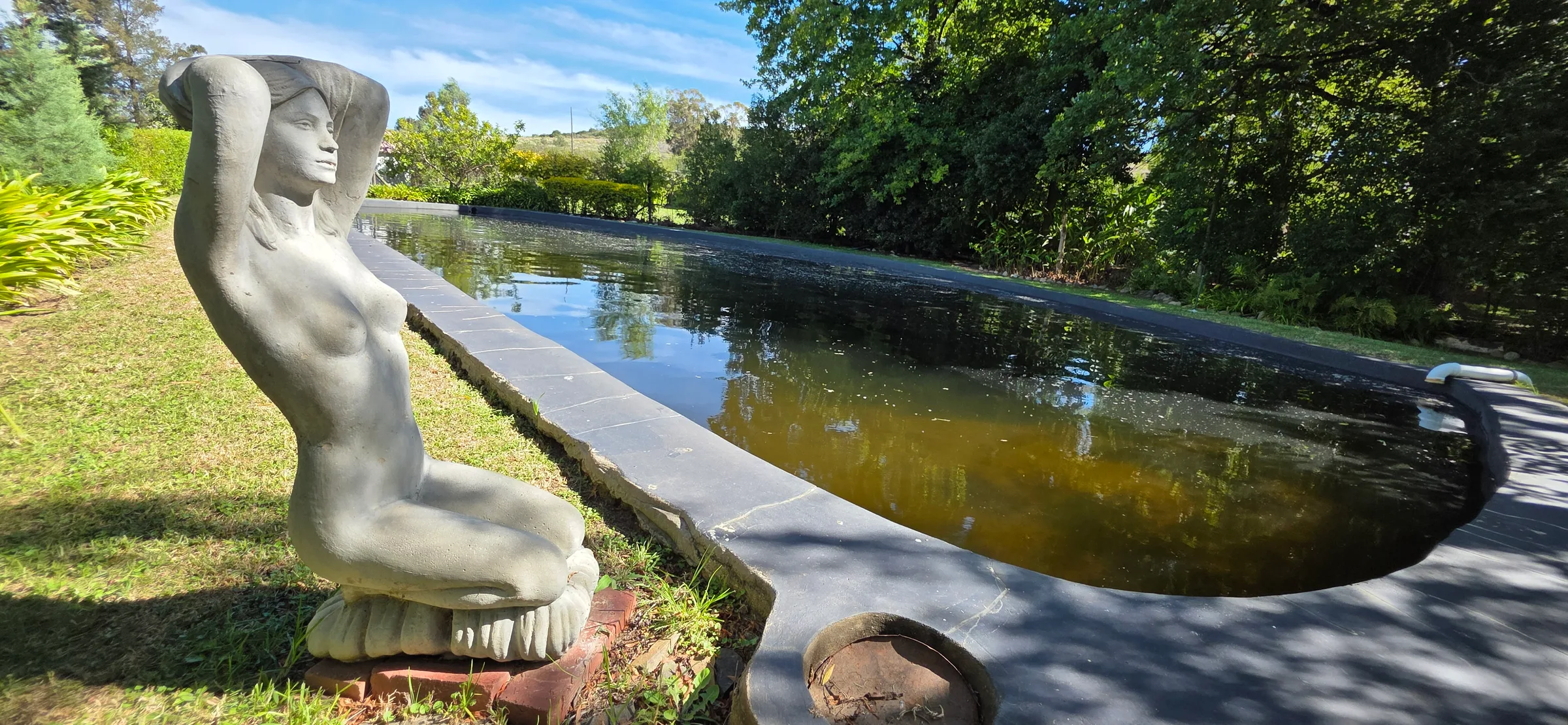 Wolwekloof Estate — long reflecting pool with sculpture