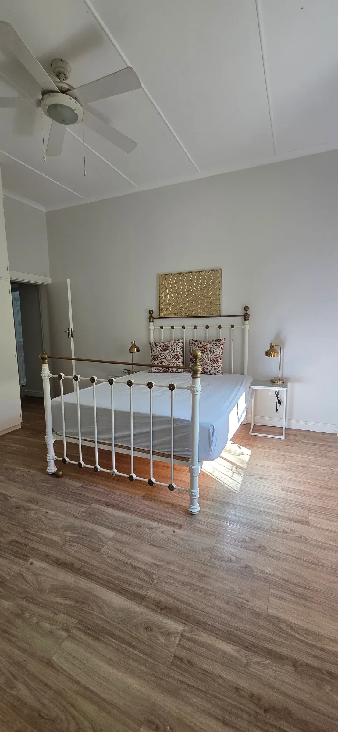 Wolwekloof Estate — bedroom with iron bed frame