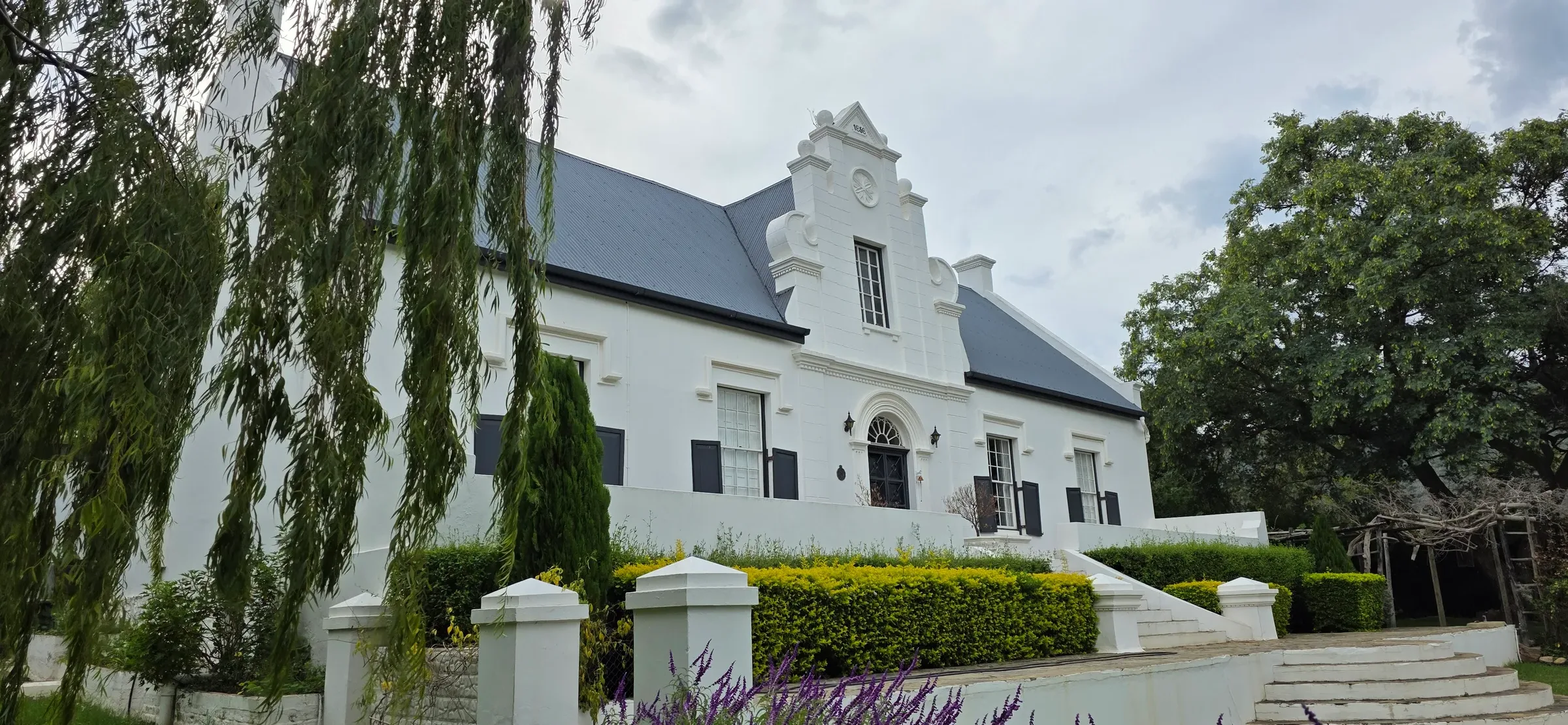 Wolwekloof Estate — manor house with lavender and reflecting pool